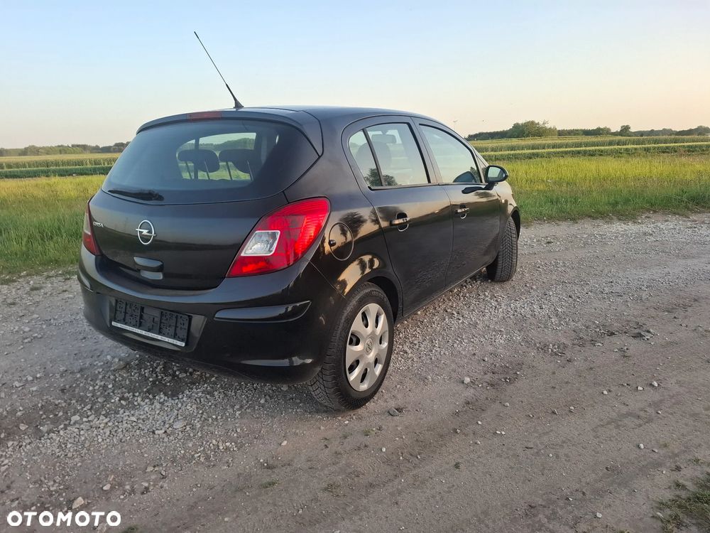 Opel Corsa 1.2 16V Enjoy - 11