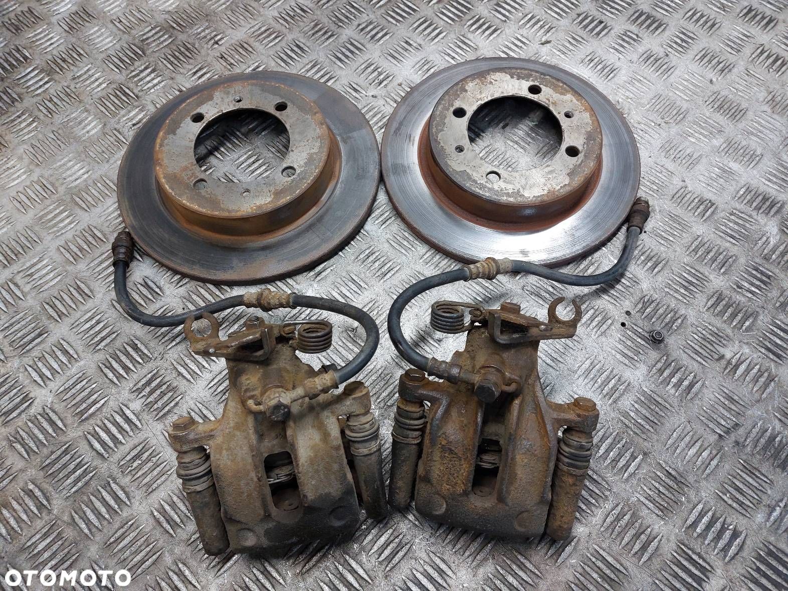 TARCZE HAMULCOWE TYŁ + KLOCKI + ZACISKI VOLVO V40 I LIFT - 1