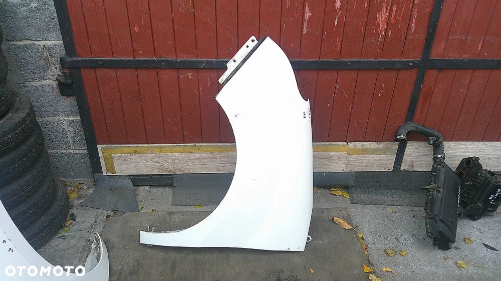 FIAT DOBLO II BŁOTNIK LEWY 249 - 1