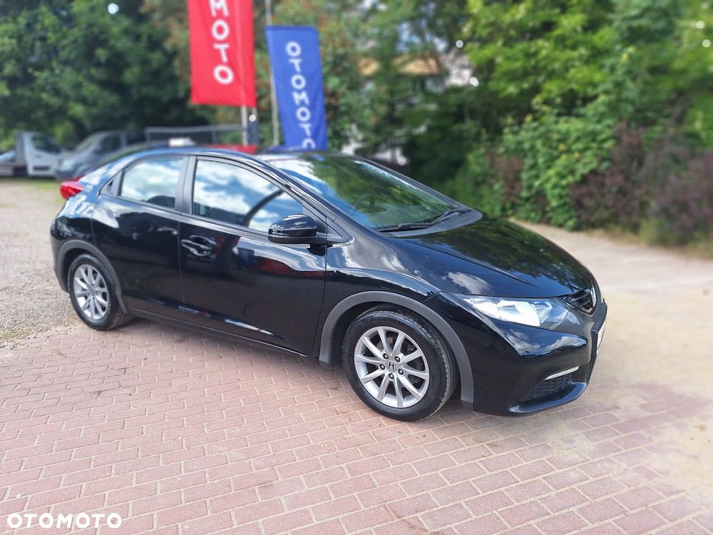 Honda Civic 1.4 i-VTEC Elegance - 9