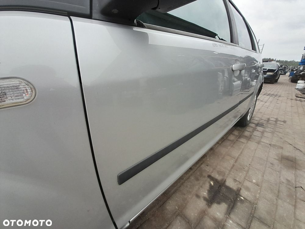 DRZWI LEWE PRZEDNIE LEWY PRZÓD FORD FOCUS MK2 KOLOR: 03 - 3