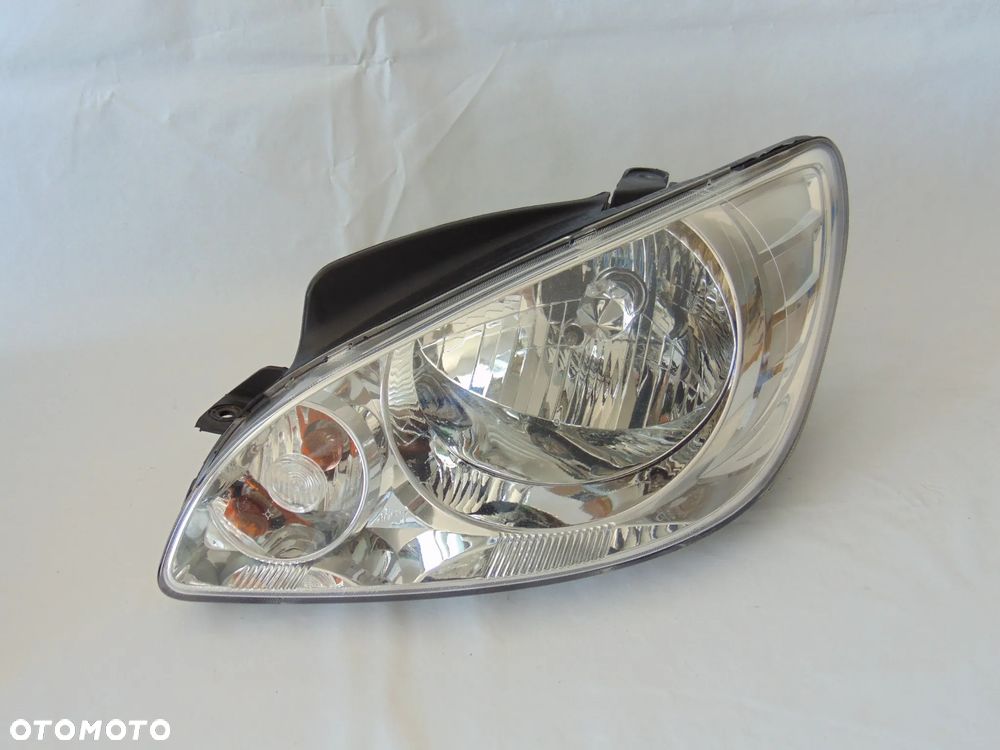 EUROPA oryginalna lampa przednia przód lewa hyundai Getz FL lift 05-09r - 1