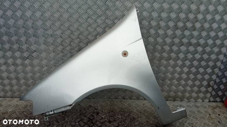BŁOTNIK LEWY PRZEDNI FIAT PUNTO 2 - 1