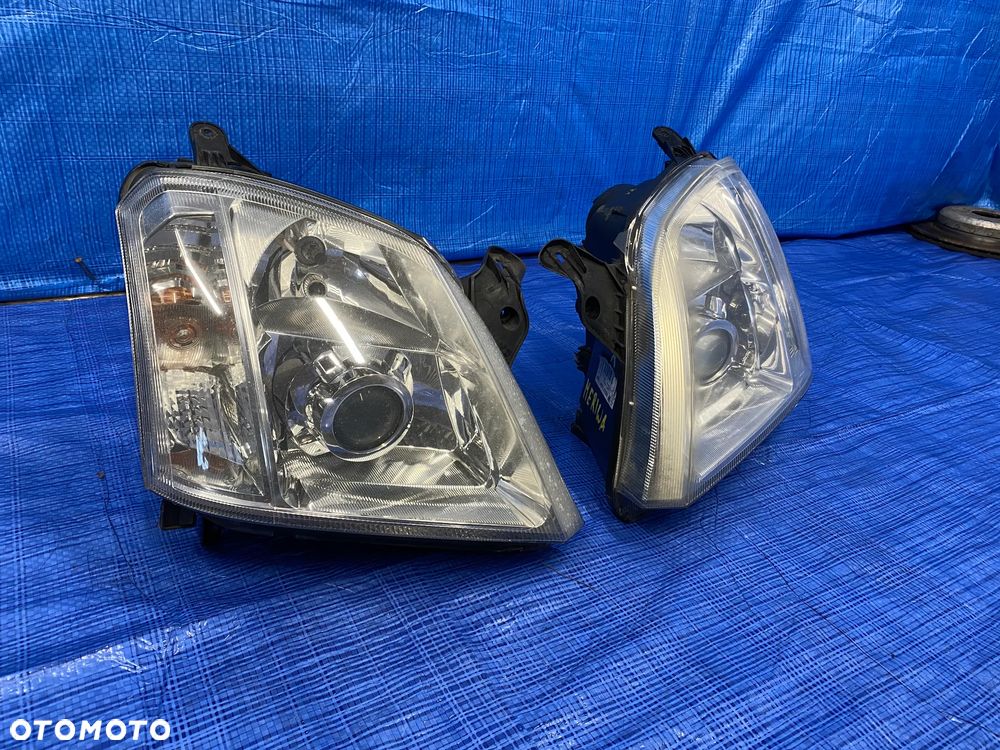 LAMPY LAMPA LEWA PRAWA LEWY PRAWY PRZÓD PRZEDNIA XENON KSEON OPEL MERIVA A LIFT 93321054 93321055 EUROPA ORYGINAŁ - 3