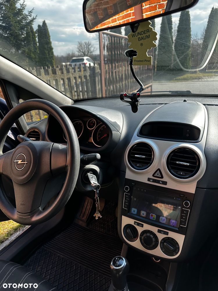 Opel Corsa 1.4 16V Cosmo - 9