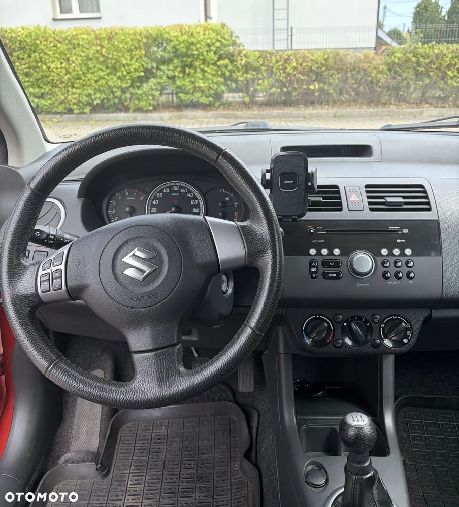 Suzuki Swift 1.3 Club - 9