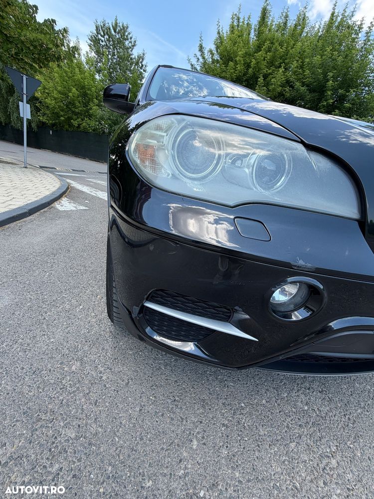 BMW X5 2010 — imagine 12