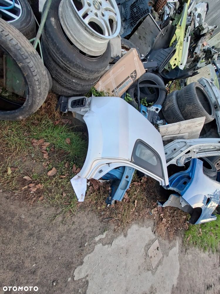 hyundai tucson 08 błotnik tył lewy lub prawy bez listew waski poznan - 1