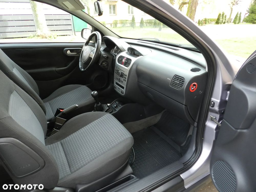Opel Corsa 1.2 16V Cosmo - 7