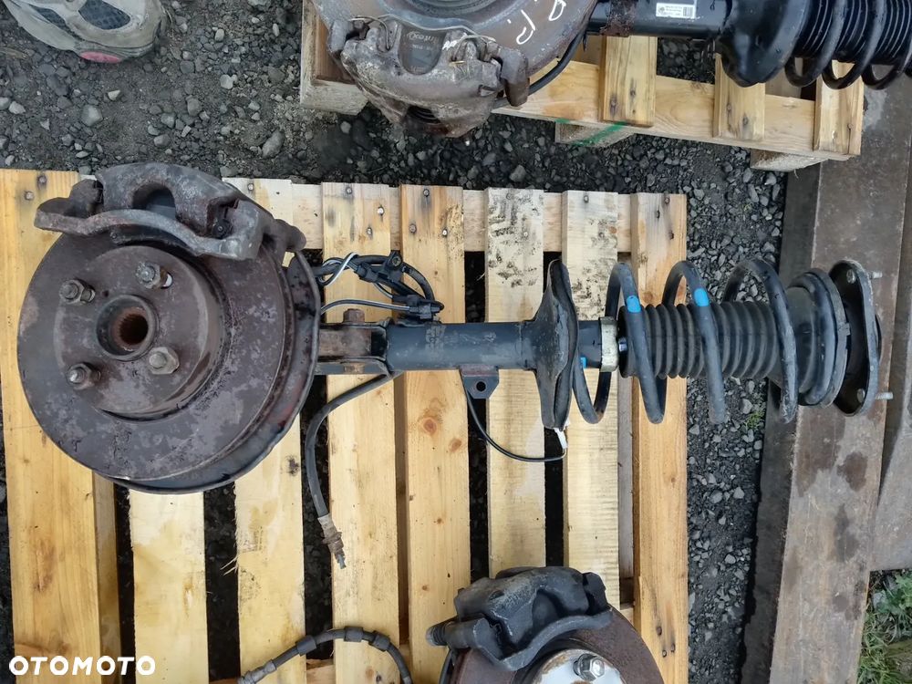 TOYOTA COROLLA E12 2.0 D-4D AMORTYZATOR ZWROTNICA PRZÓD LEWY - 1