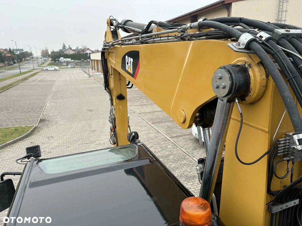 Caterpillar M 315D ROTOTILT ENGCON SZCZYPCE PODPORY - 18