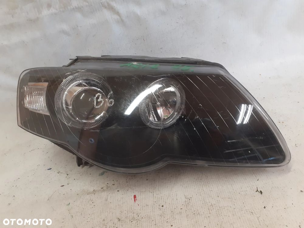 .  PRZOD PRZEDNIA PRAWA LAMPA VOLKSWAGEN PASSAT B6 CZARNA - 1