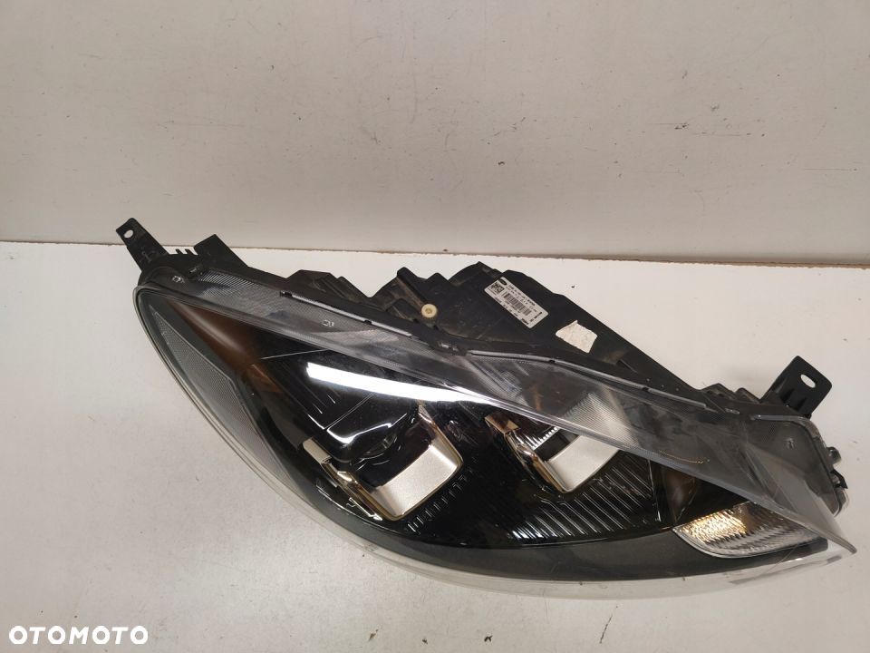 Lampa Ford OE 90187826 PRAWA - 2