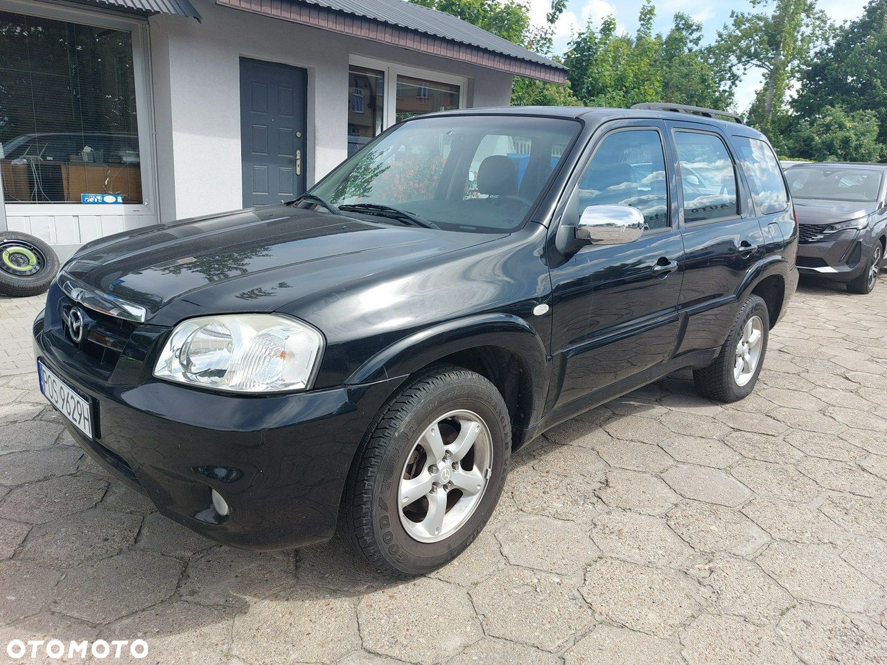 Mazda Tribute - 3