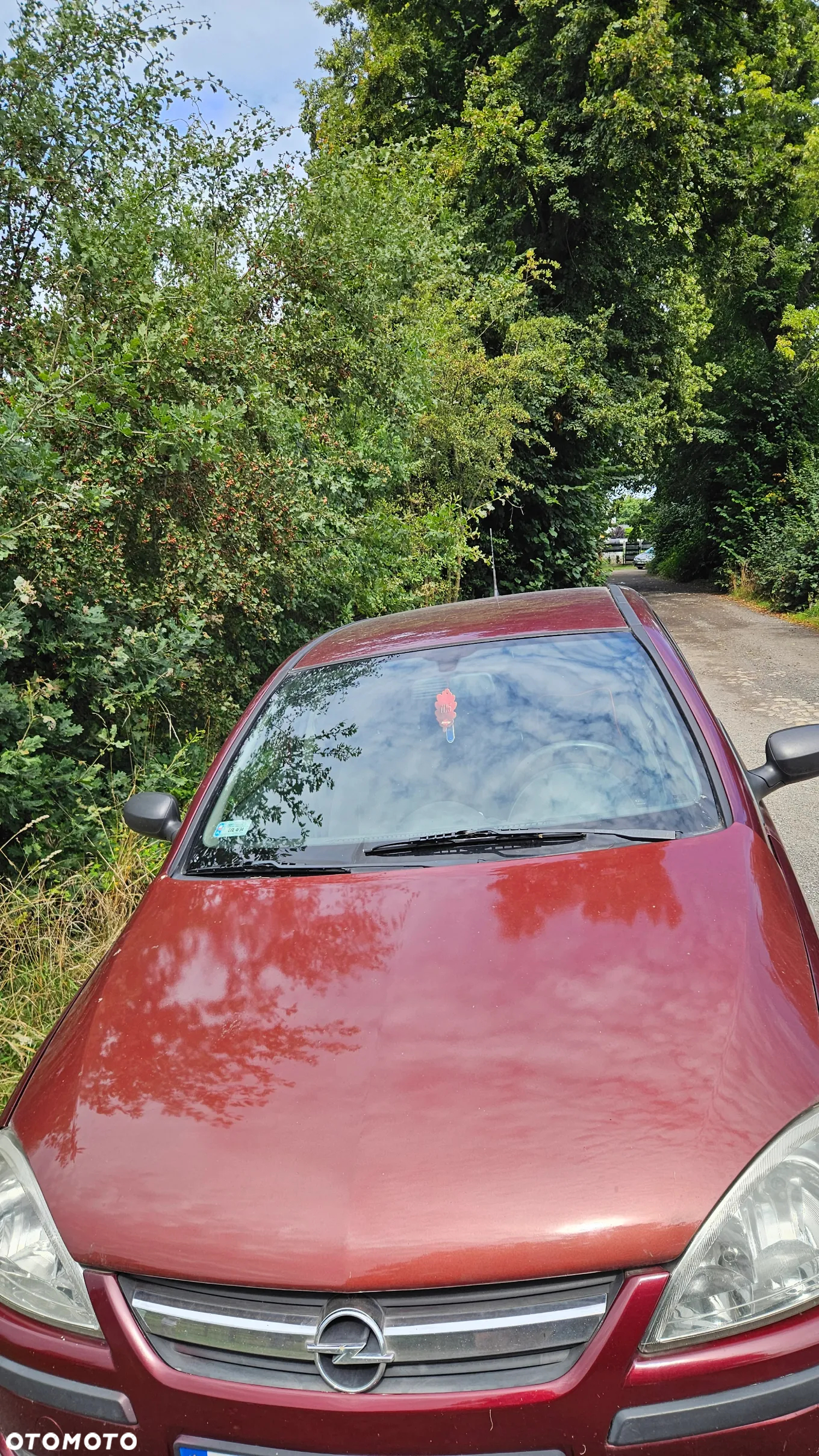 Opel Corsa 1.2 16V Cosmo - 5