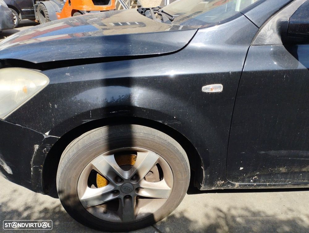 GUARDA-LAMAS FRENTE ESQUERDO KIA CEE´D EMOTION - 1