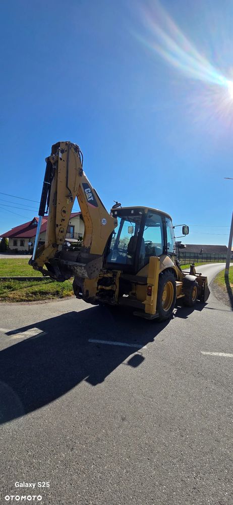 Caterpillar 428 E - 11