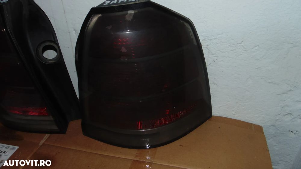 Stopuri stanga-dreapta Opel Zafira B an 2010 - 2