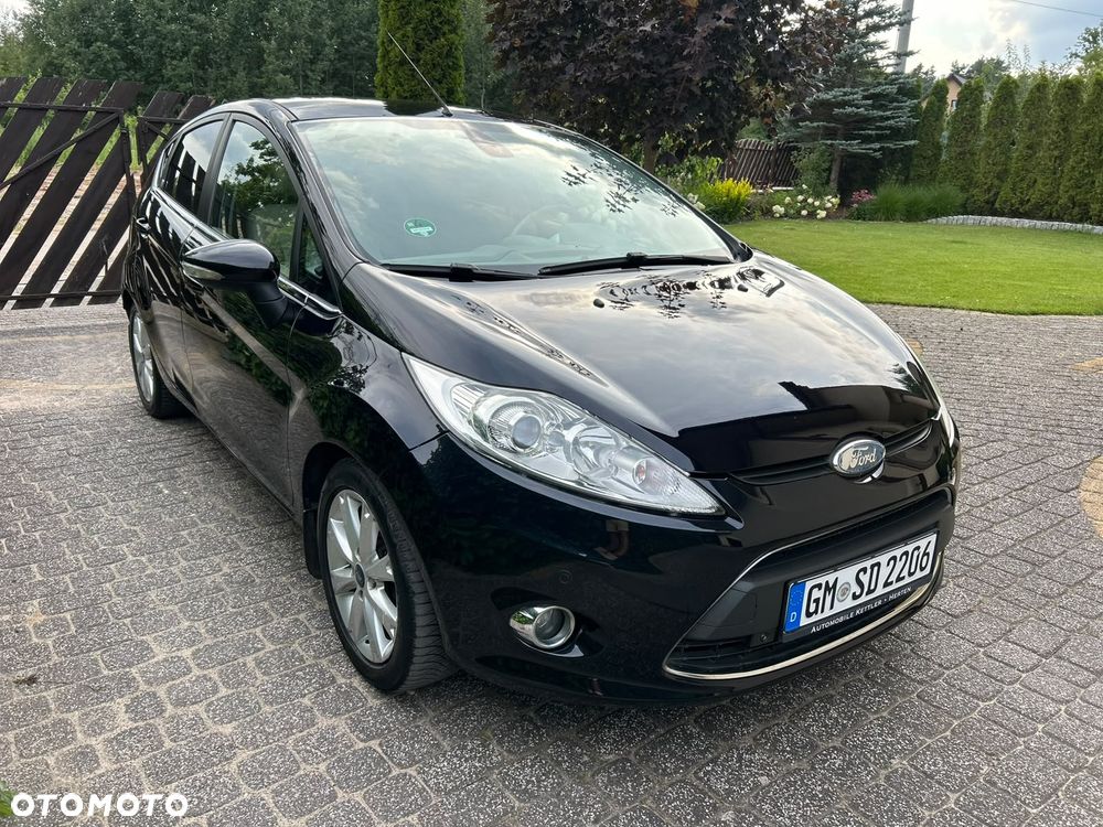 Ford Fiesta 1.4 Ghia - 7