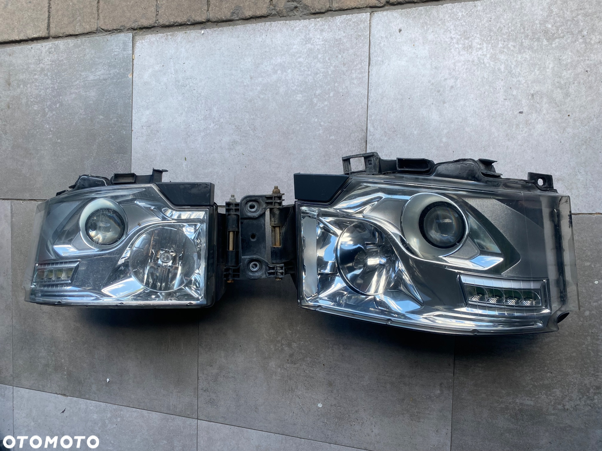RENAULT GAMA T RANGE LAMPA LEWA/PR  89207611 ORG - 2