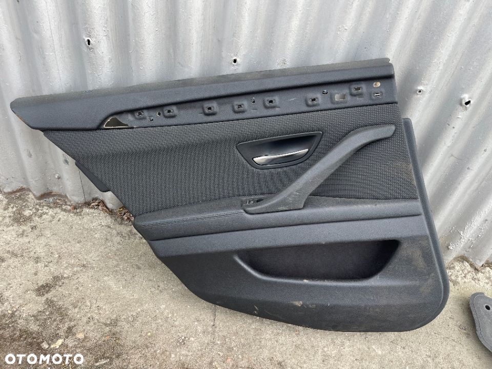 Boczek drzwi tylny lewy tapicerka Bmw F10