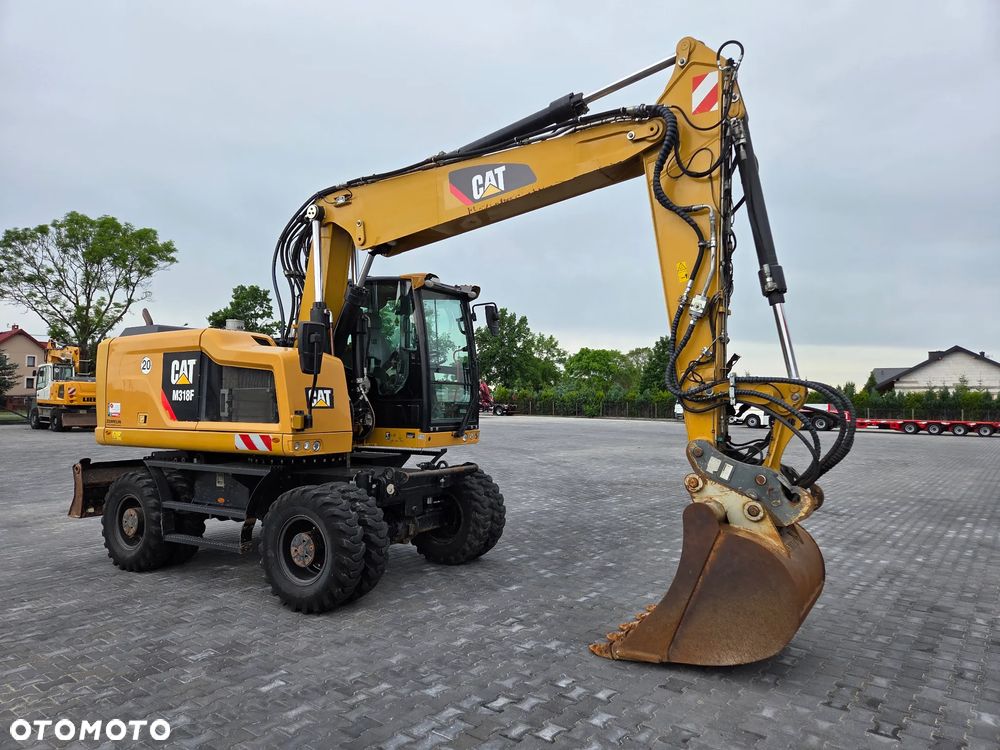 Caterpillar M318F / z Niemiec / - 6
