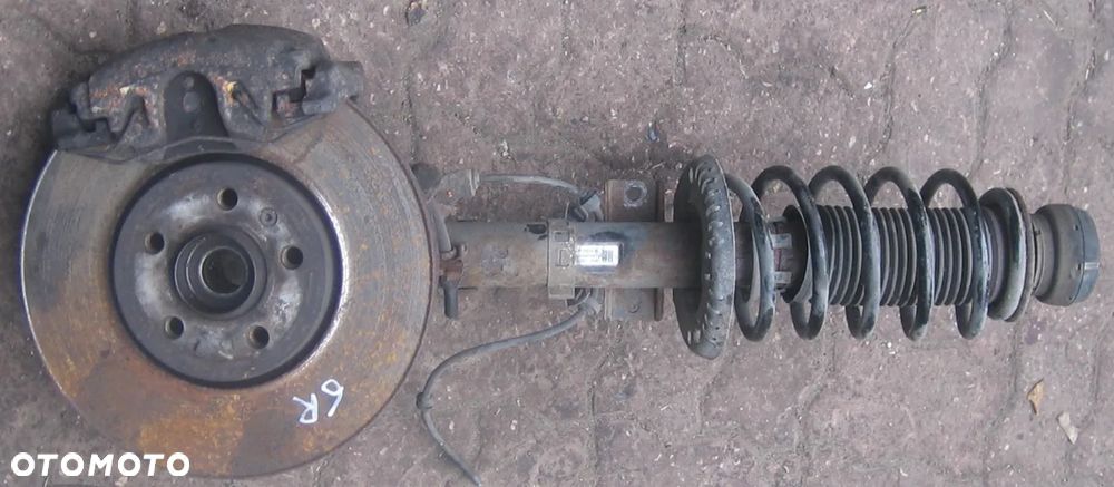 1.6TDI FABIA II POLO 6R zwrotnica piasta lewa amortyzator - 1