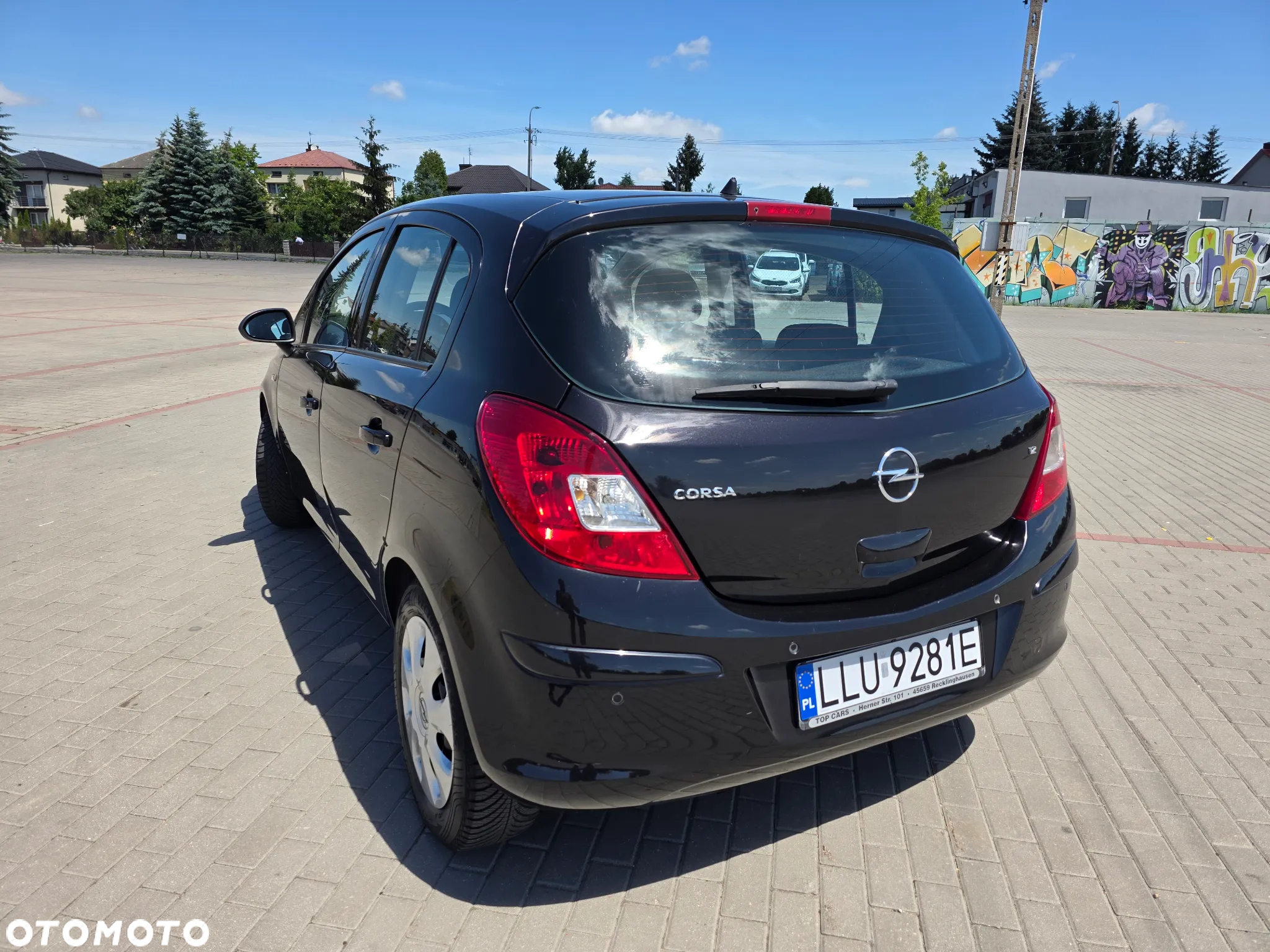 Opel Corsa 1.2 16V Cosmo - 8