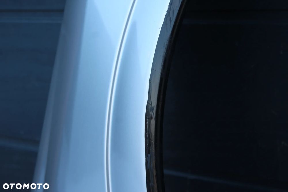 BŁOTNIK PRAWY PRZEDNI PRAWY PRZÓD OPEL ASTRA G II Z147 - 11