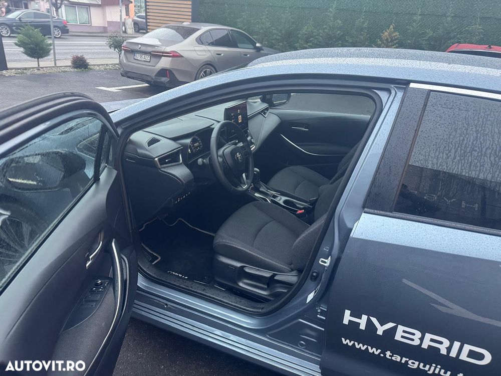 Toyota Corolla TS 1.8 HSD Dynamic - 13