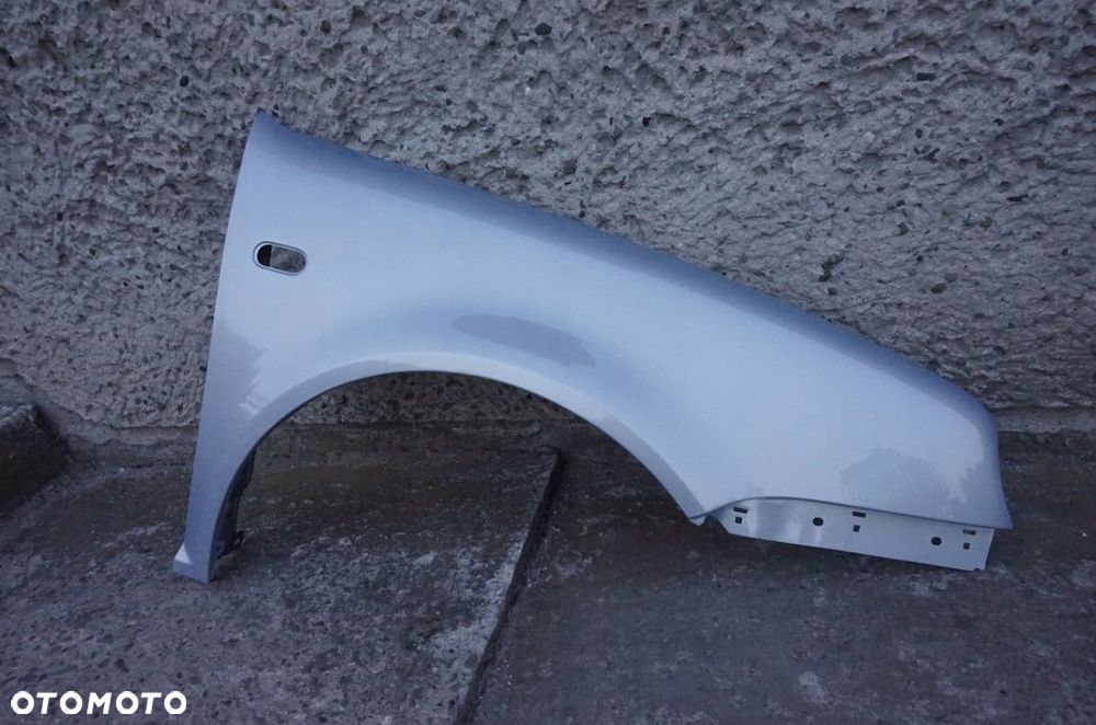 BŁOTNIK PRZEDNI PRAWY VW GOLF IV LB7Z