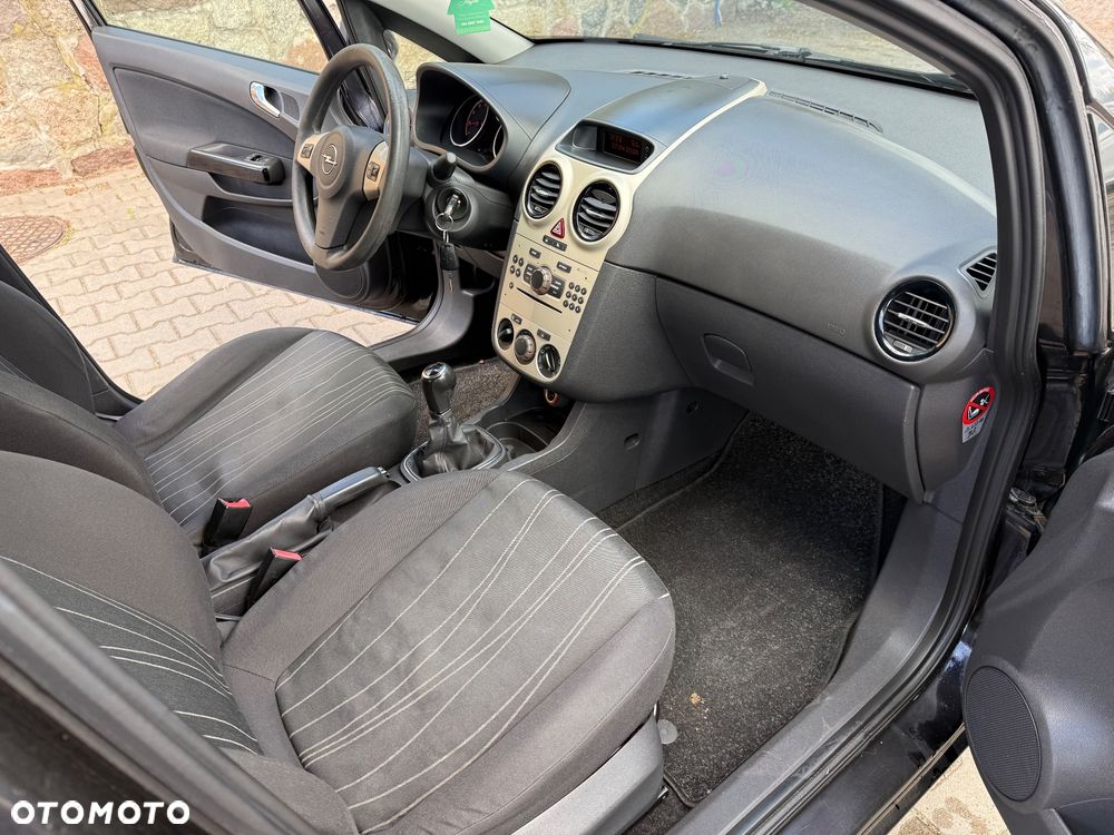 Opel Corsa 1.2 16V Enjoy - 11