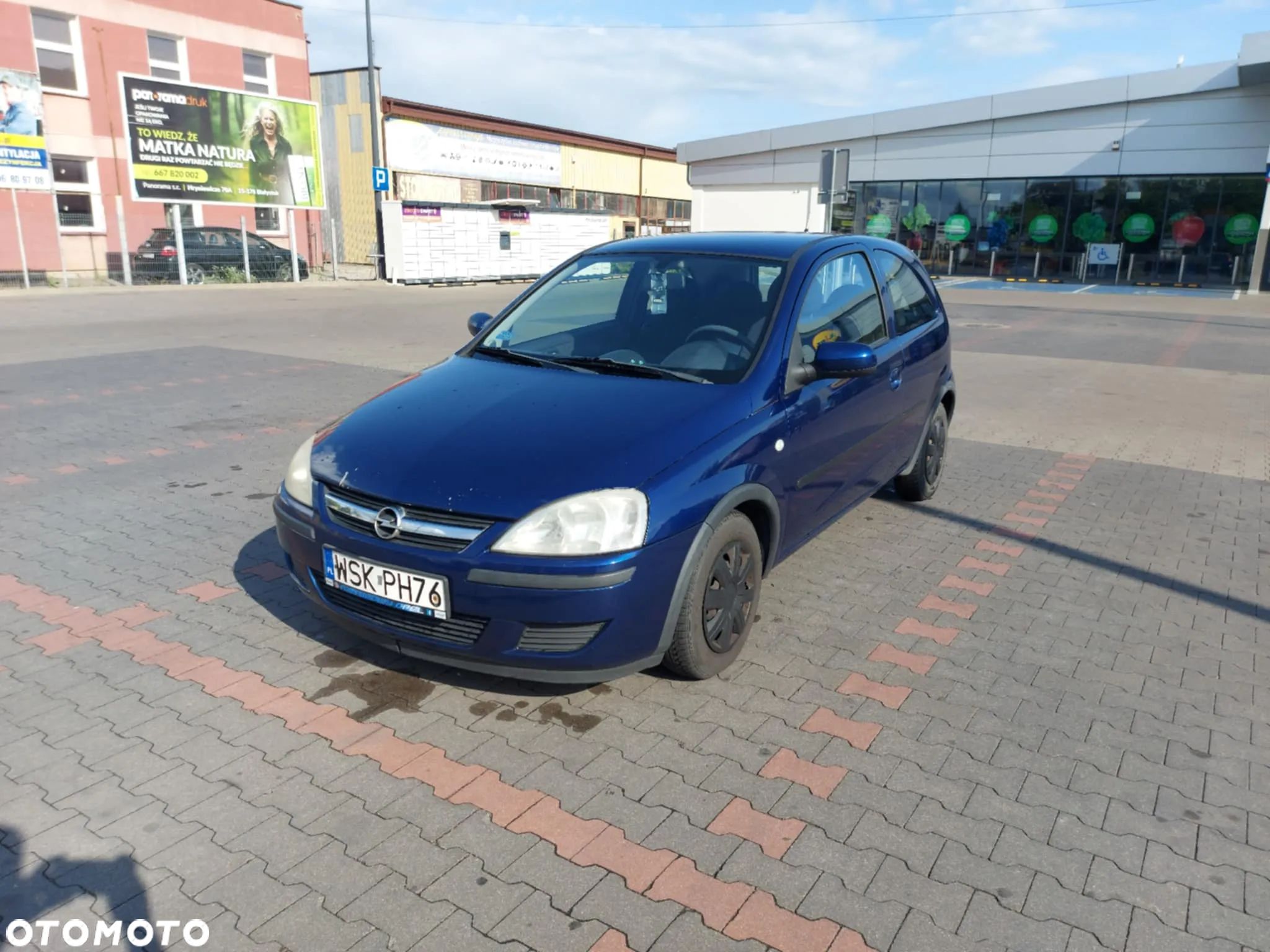 Opel Corsa 1.0 12V Cosmo - 1