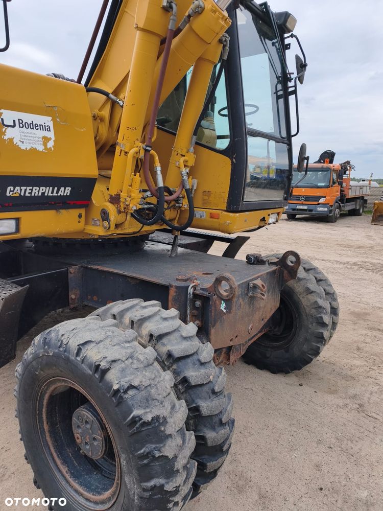 Caterpillar M318 - 3