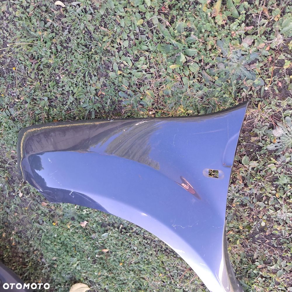 Błotnik lewy przód Dacia Duster 10 -17 przedni OE oryginał - 2