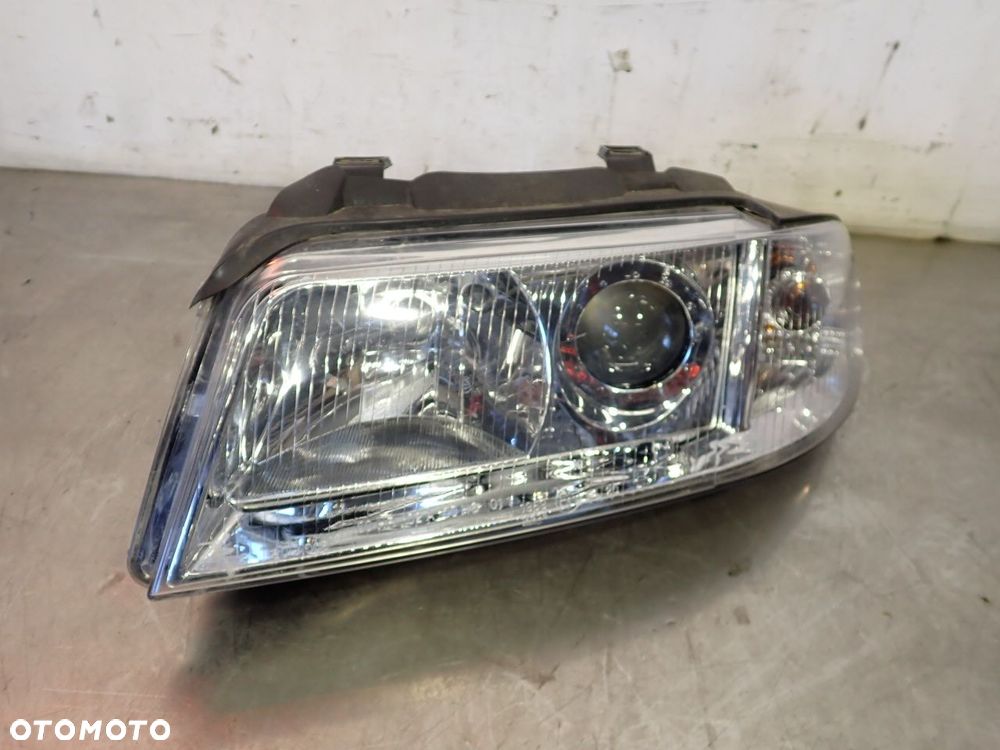 LAMPA LEWA PRZEDNIA SOCZEWKA AUDI A4 B5 - 1