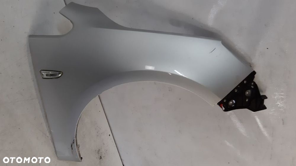 * BŁOTNIK PRAWY OPEL ASTRA J IV LIFT  Z176 SREBRNY do malowania - 2