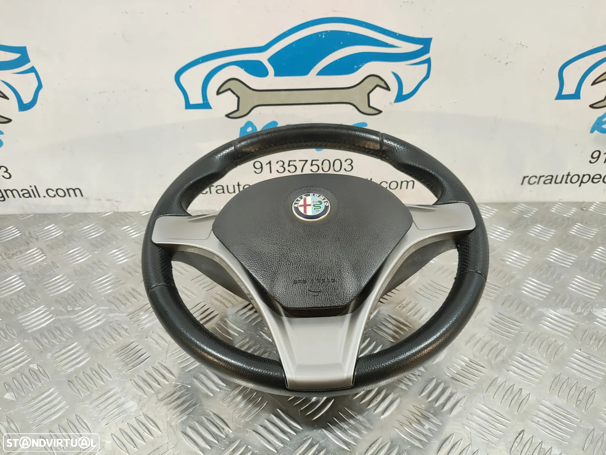 VOLANTE GUIADOR COMPLETO ALFA ROMEO MITO 955 PELE PERFURADA AIRBAG 71753934 D6100190234 1560891750 ALFA ROMEO GIULIETTA - 2