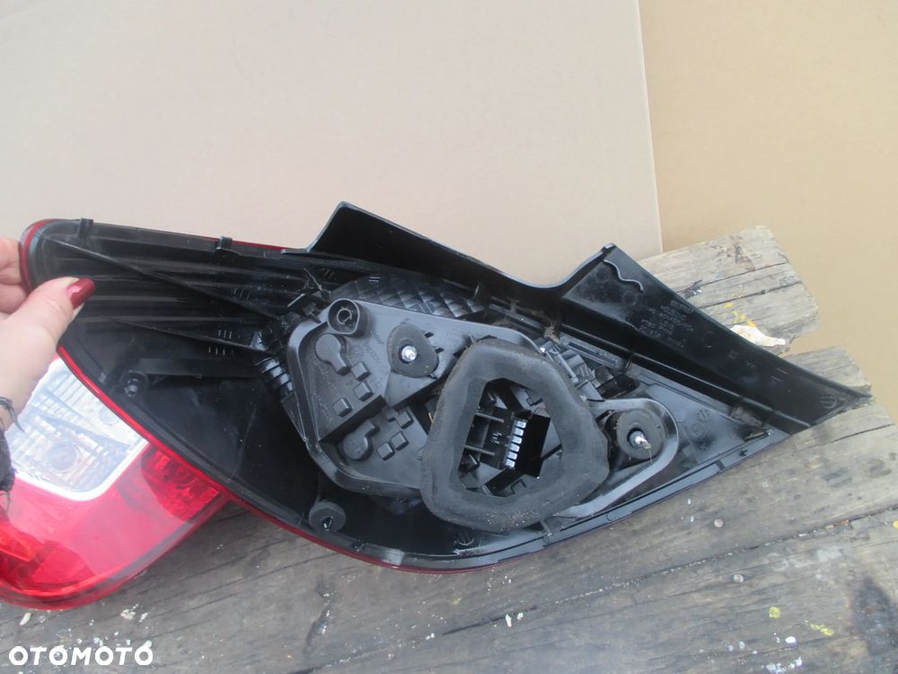 lampa tył Opel Corsa D  5 drzwiowa Europa - 4