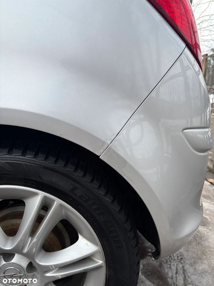 Opel Corsa 1.2 16V Enjoy - 23