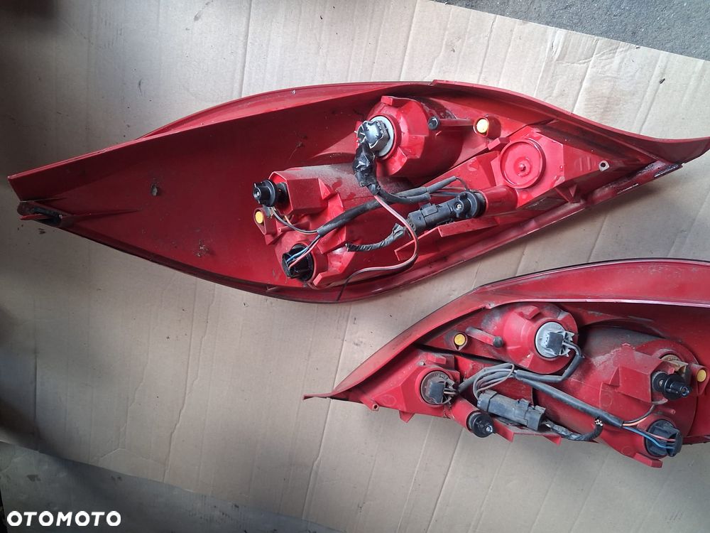 Lampa tył OPEL TIGRA B prawa OE - 6