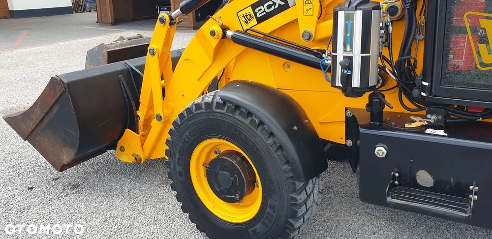 JCB 2CX tylko 2835mtg! z ROTOTILT / 3 łyżki /widły/centralne smarowanie/klimatyzacja / STAN IDEALNY !! - 19