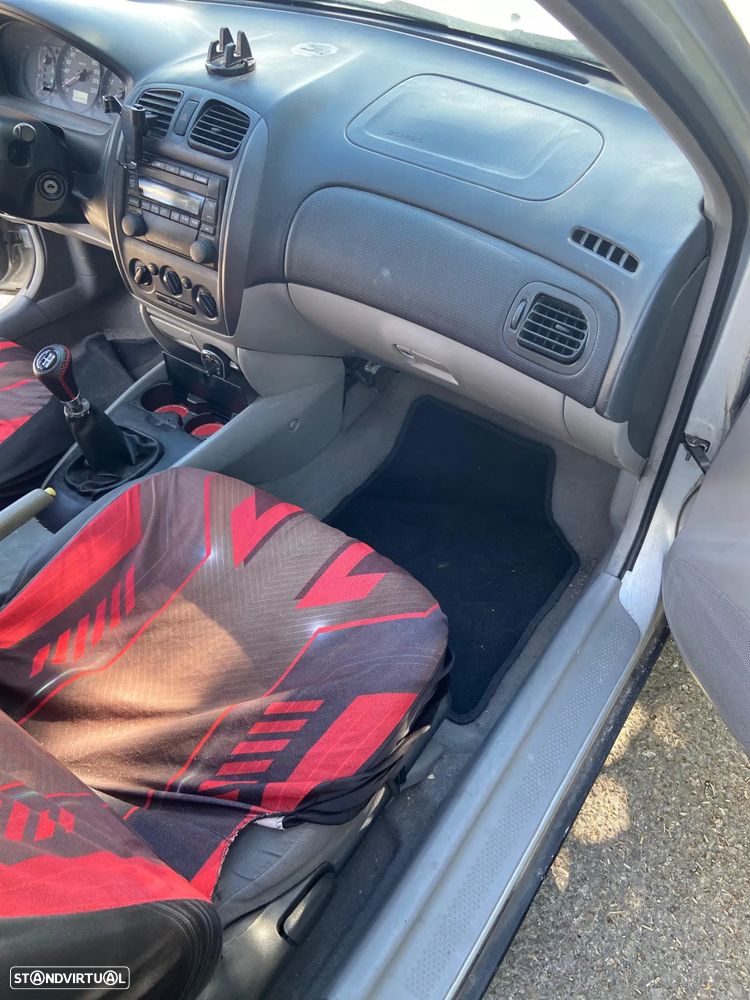 Mazda 323 F 1.3 Base F/L - 11