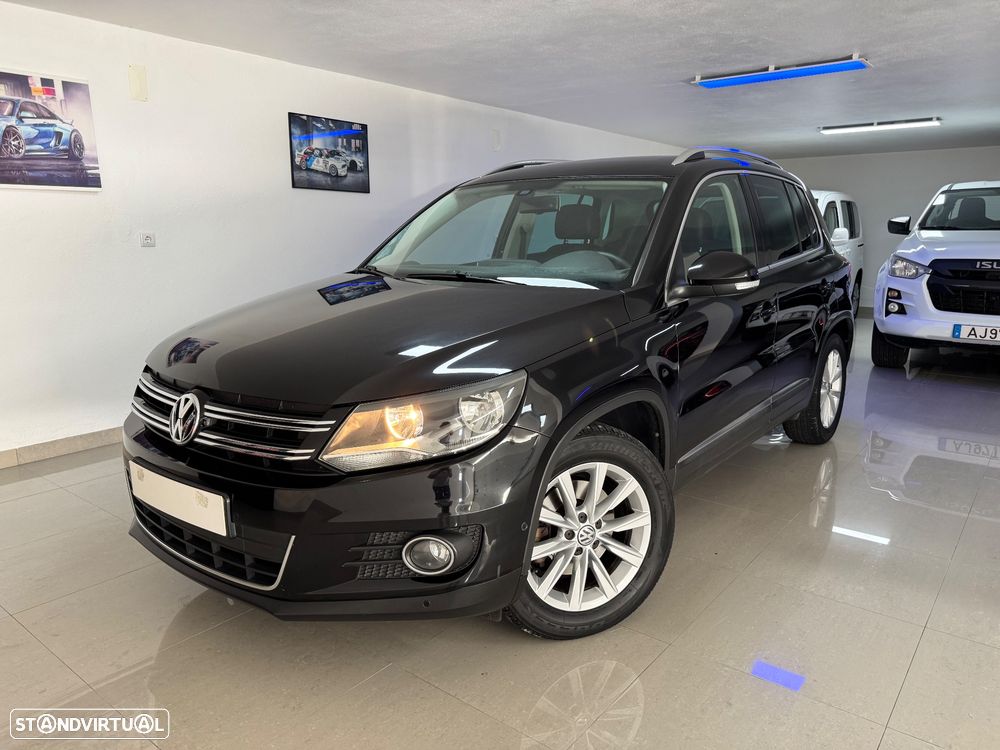 VW Tiguan 1.4 TSi BlueMotion Lounge Sport & Style - 1