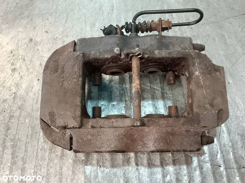 ZACISK HAMULCOWY LEWY TYŁ PORSCHE CAYENNE 3.2 V6 - 7