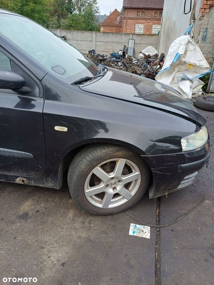Błotnik prawy Foto FIAT STILO 2002r 1.6 16v benzyna Nero Elena 632 - 1