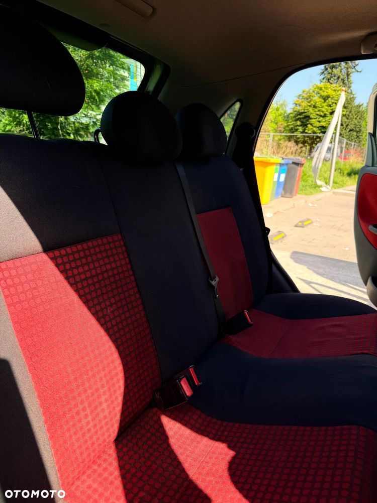 Opel Corsa 1.2 16V Cosmo - 9