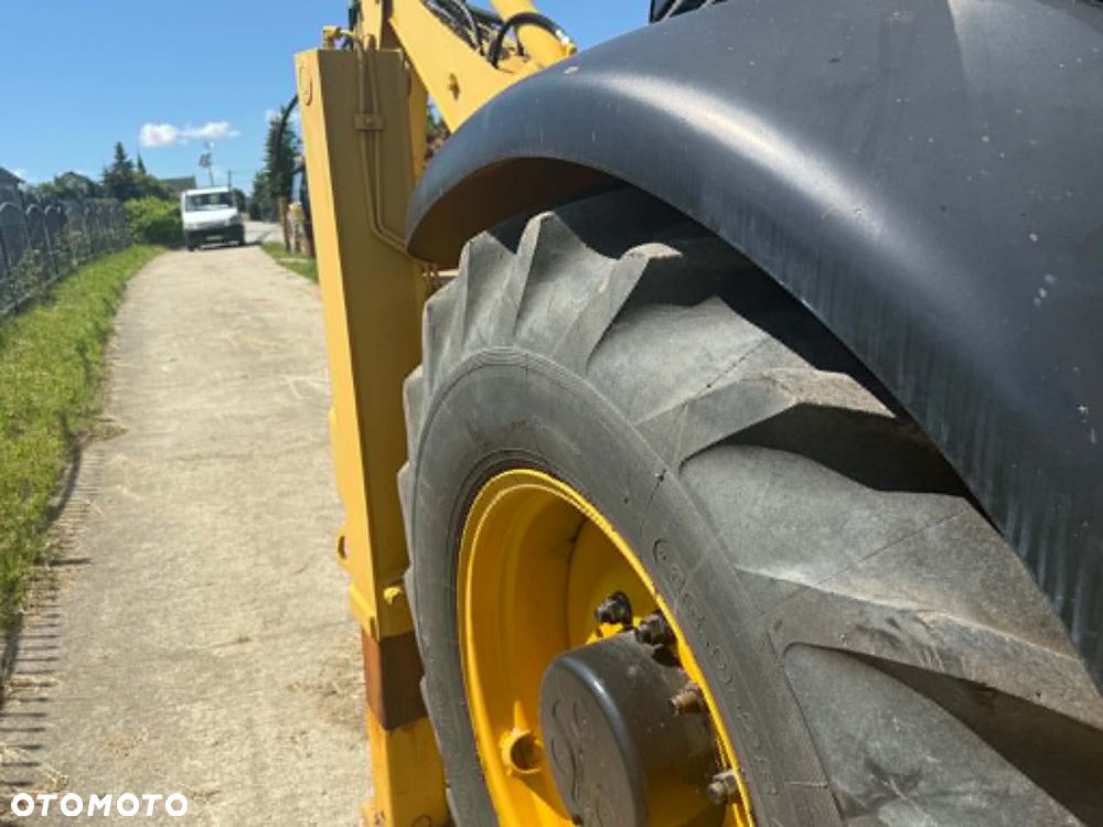 Komatsu Pełna opcja koparko-ładowarka KOMATSU WB07R, TEREX,FERMEC MF 76O - 5