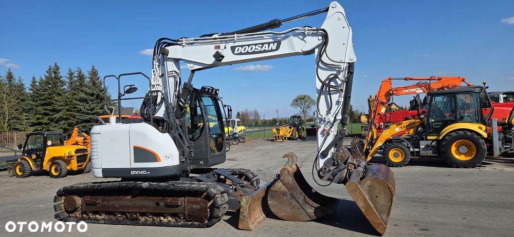 Doosan <<Doosan DX140LCR, 2015r, pług, ramie 3xłamane, 2 łyżki, z Niemiec!>> - 5