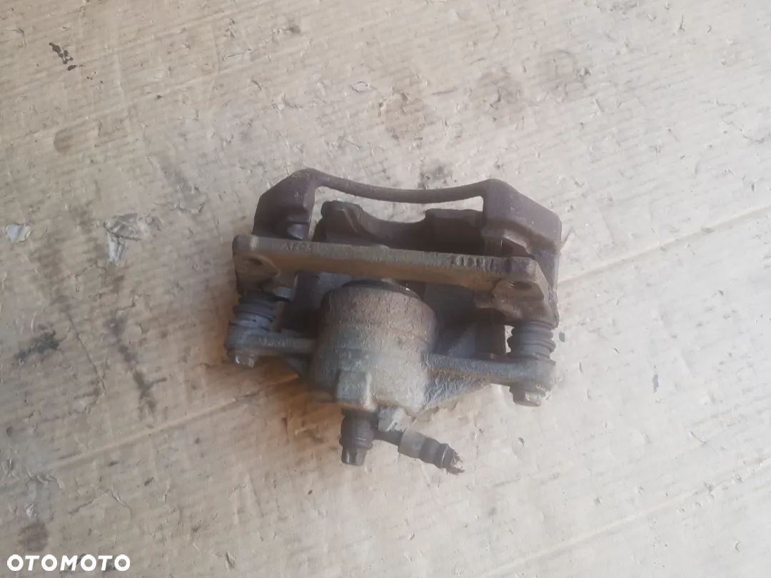 Subaru G3X Justy Suzuki Ignis MH zaciski hamulcowe zacisk przód - 9